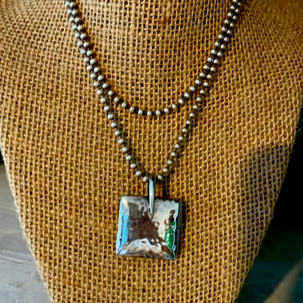 Square sterling silver pendant by Silpada.